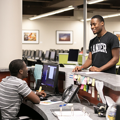 students at IT help desk